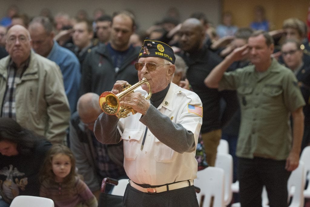 Bruce Benson plays "Taps" during the 2017 Veterans Day Assembly at Webb City High School