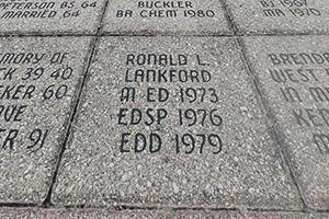 Close-up of a granite grave marker engraved with the name Ronald L. Lankford and the dates 1973, 1976, and 1979.
